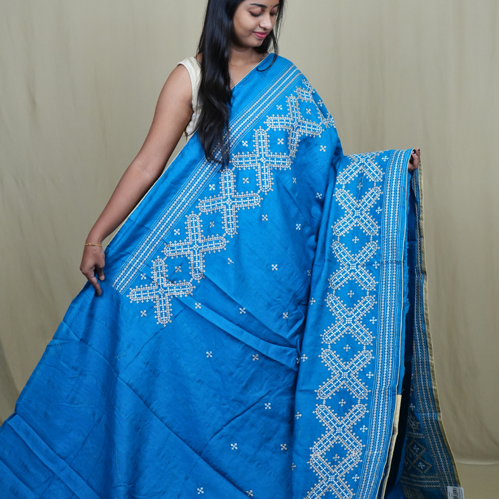 Traditional semi Tussar saree suitable for festive occasions with intricate Kutch work detailing.