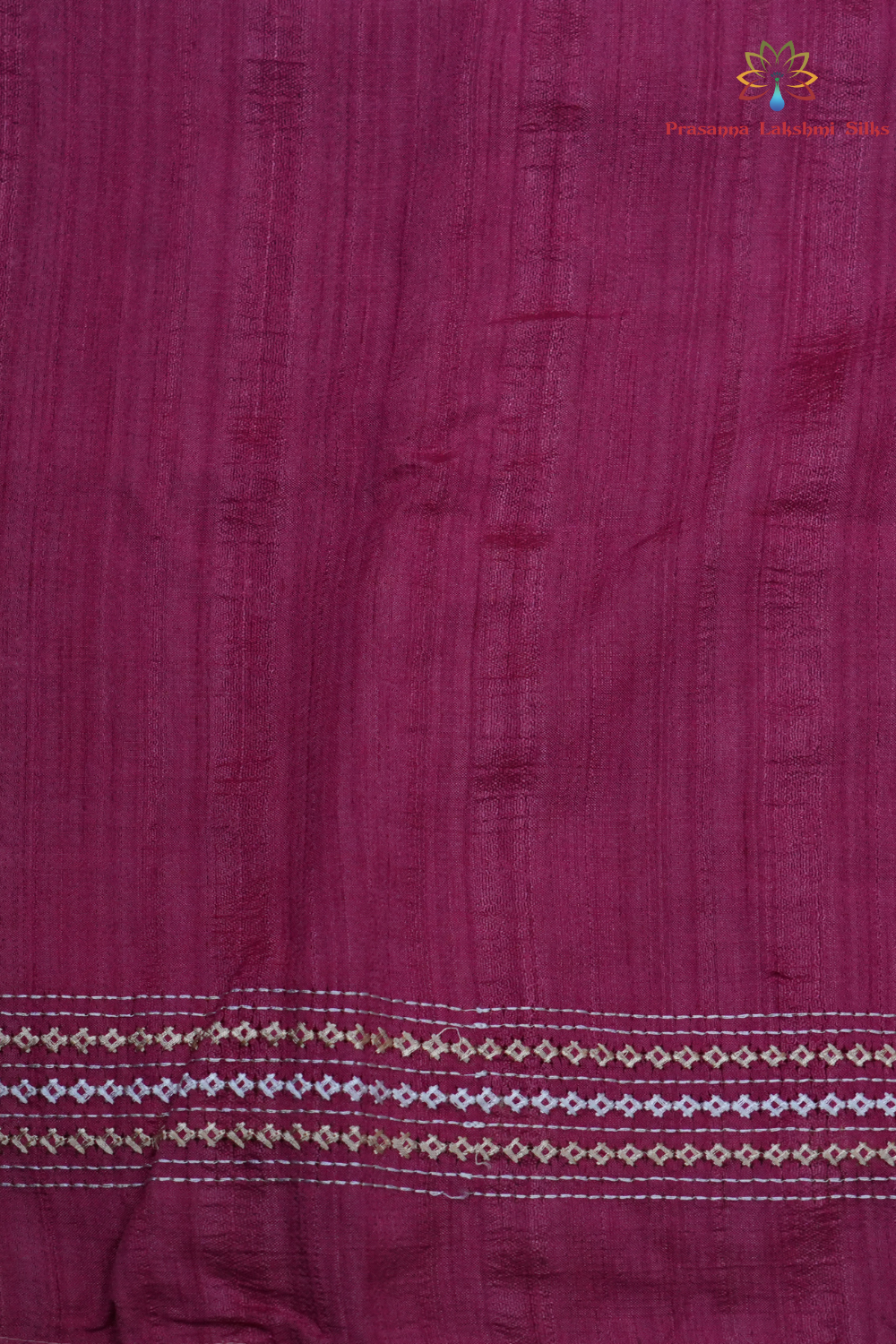 Elegant thread embroidered saree featuring rich Kutch work pallu and running blouse piece.
