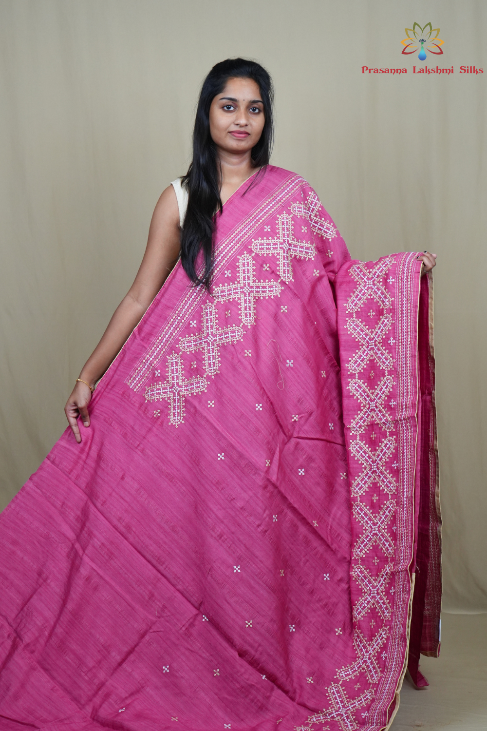 Traditional semi Tussar saree suitable for festive occasions with intricate Kutch work detailing.