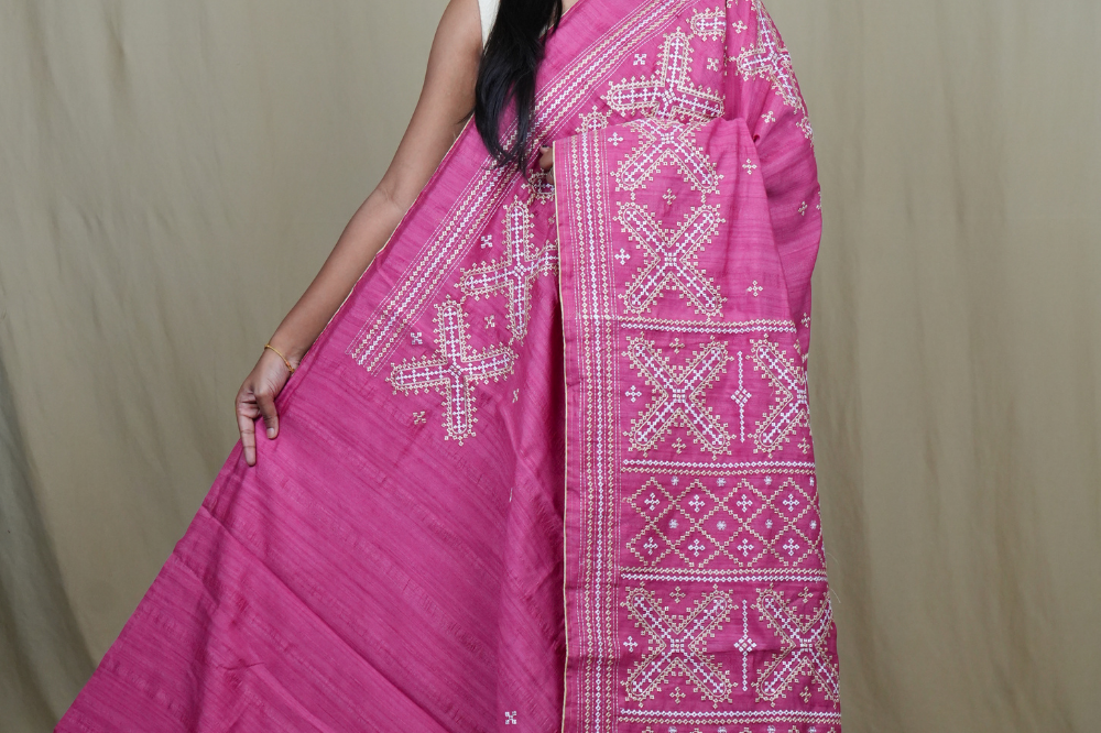 Semi Tussar silk saree with all-over small Kutch work motifs and beautiful borders.
