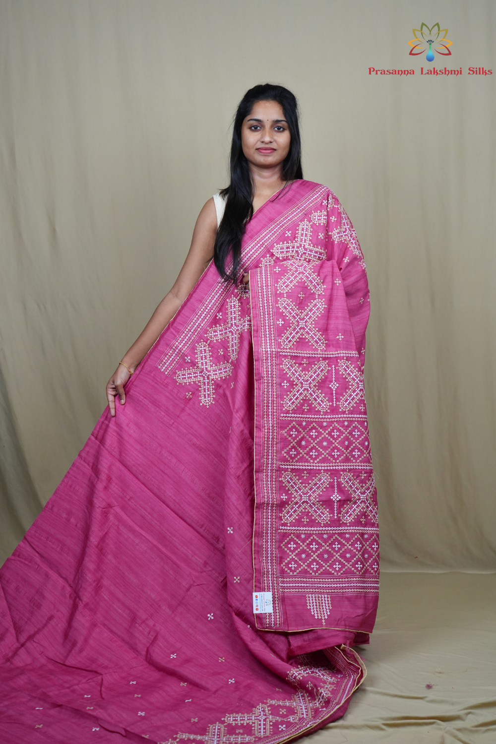Semi Tussar silk saree with all-over small Kutch work motifs and beautiful borders.
