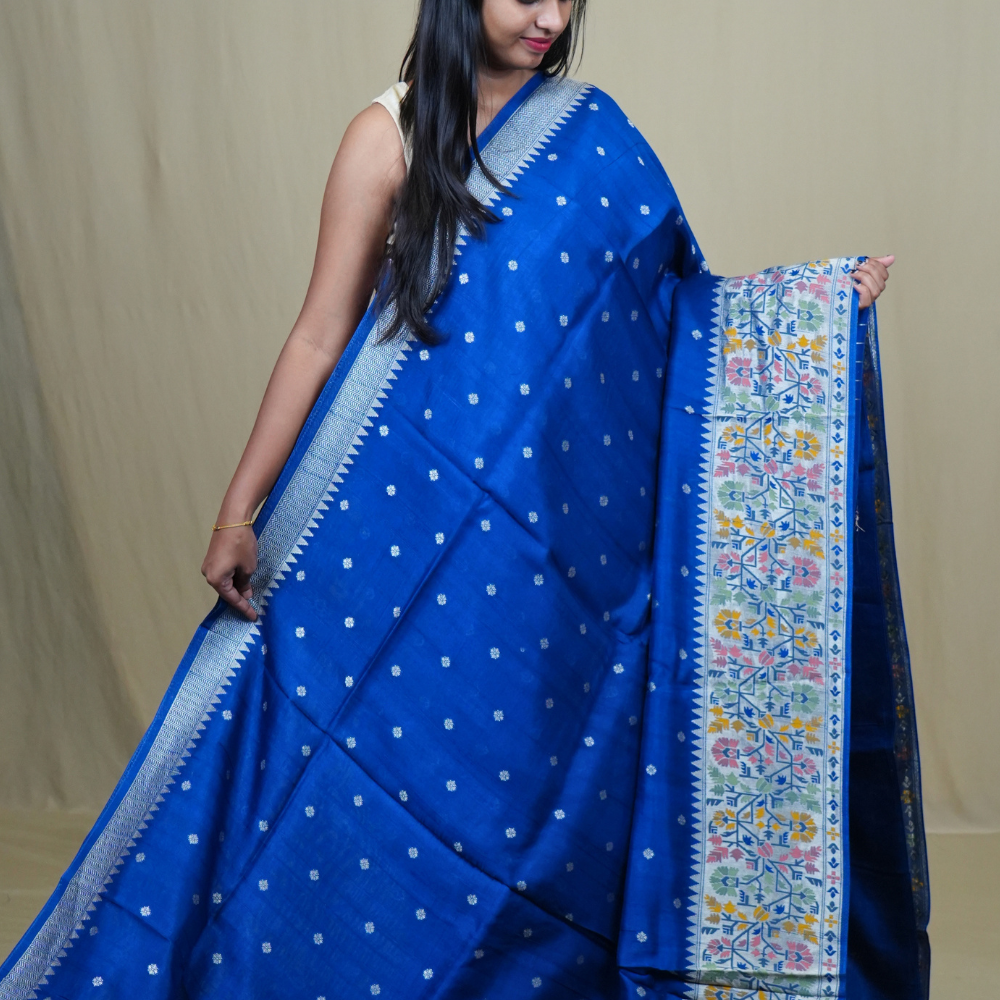 Traditional Tussar Georgette saree suitable for weddings and festive occasions with zari work.