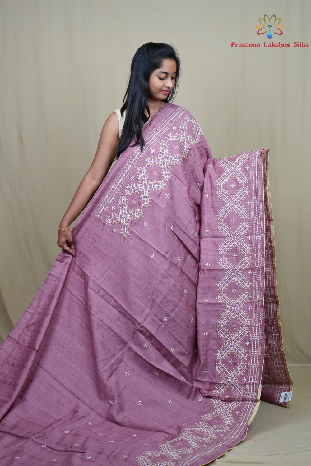 Traditional semi Tussar saree suitable for festive occasions with intricate Kutch work detailing.