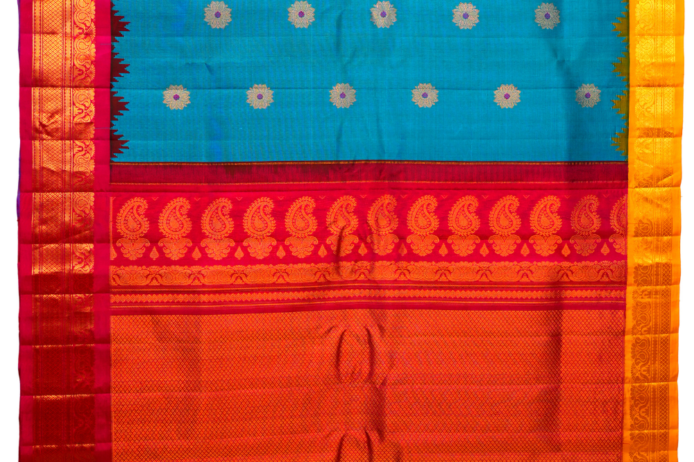 Silk Mark certified red Gadwal silk saree with  zari woven border, perfect for weddings and festive occasions
