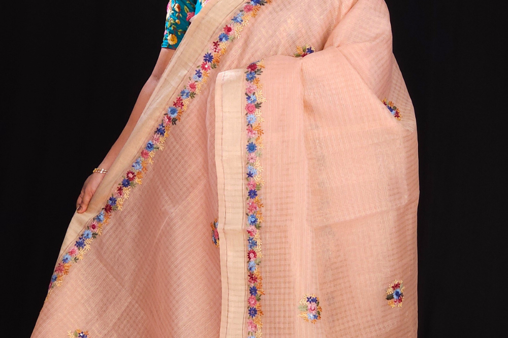 Peach Designer organza saree with embroidered borders