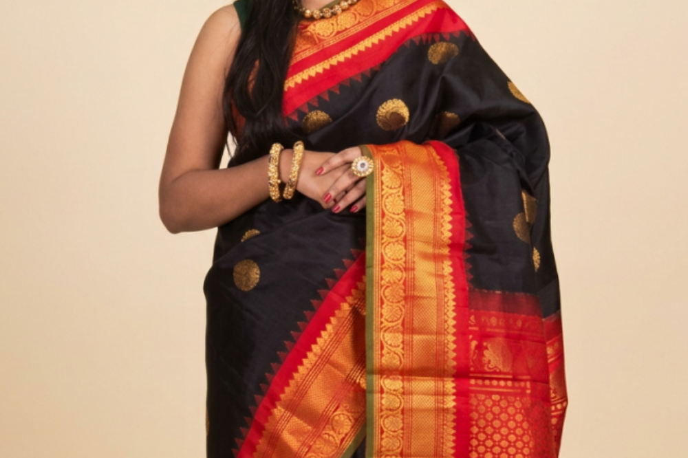 Black Handloom Gadwal Pure Silk Saree with rich red zari woven border and brocade pallu
