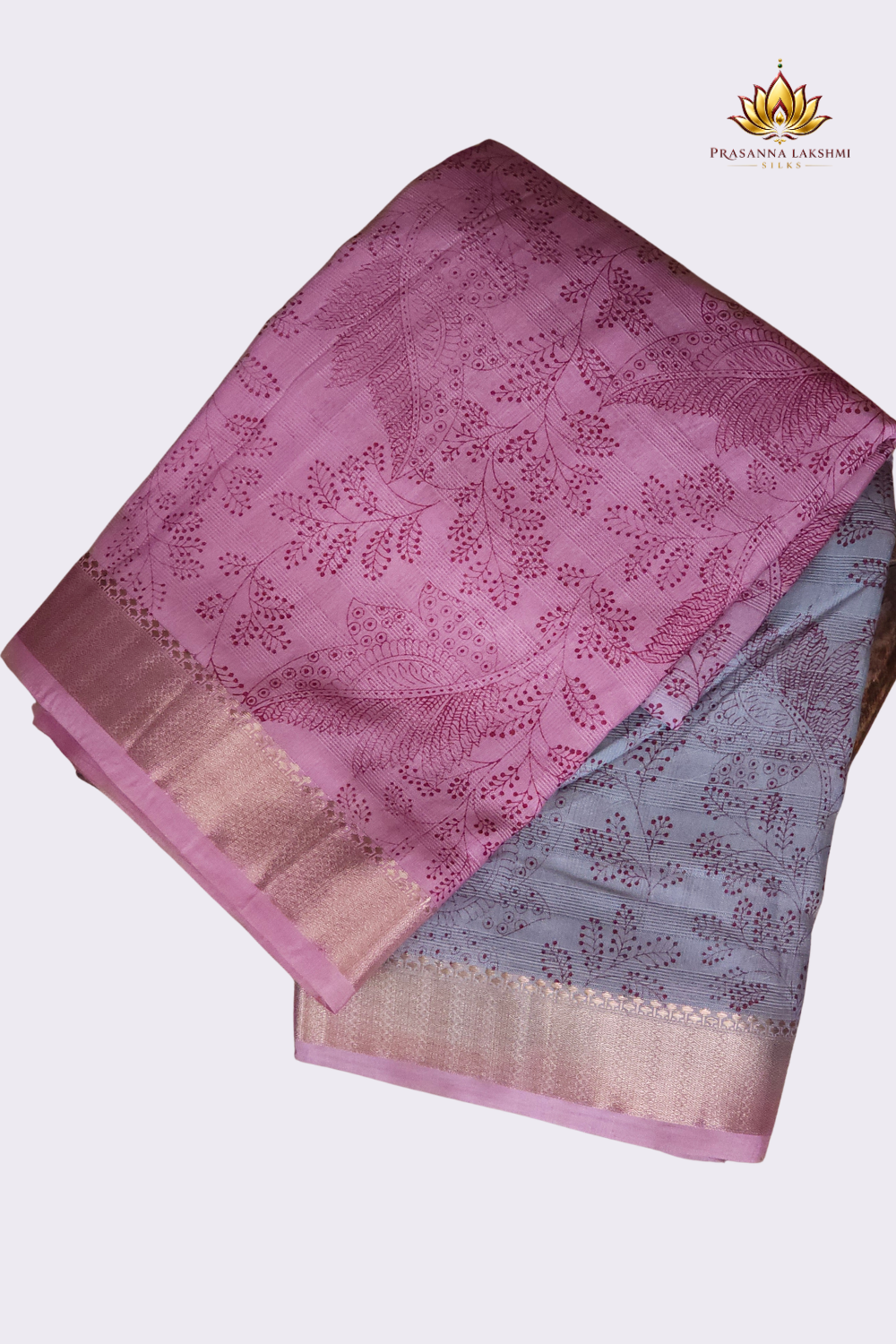 Women's premium dual colour linen saree featuring digital floral design, zari border, and stylish printed pallu.