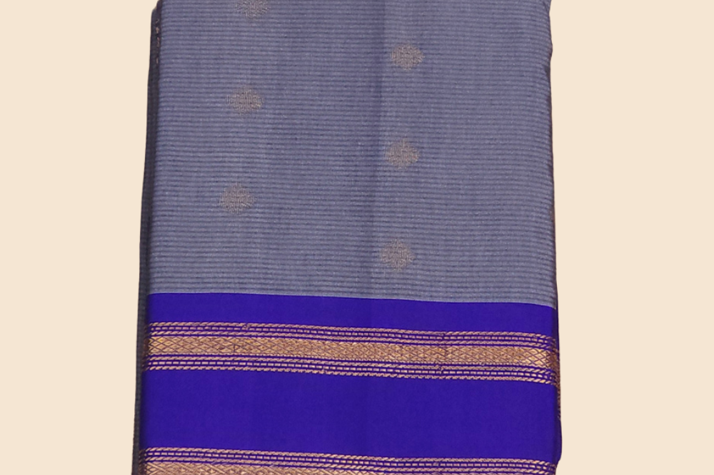 Handloom semi Gadwal saree featuring rich brocade pallu and contrast blouse
