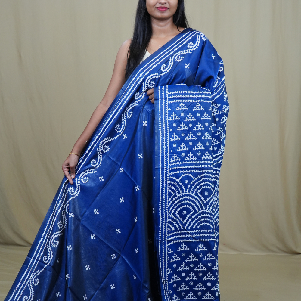 Semi Bangalore Silk Saree with all-over Kutch work motifs and rich embroidered pallu.
