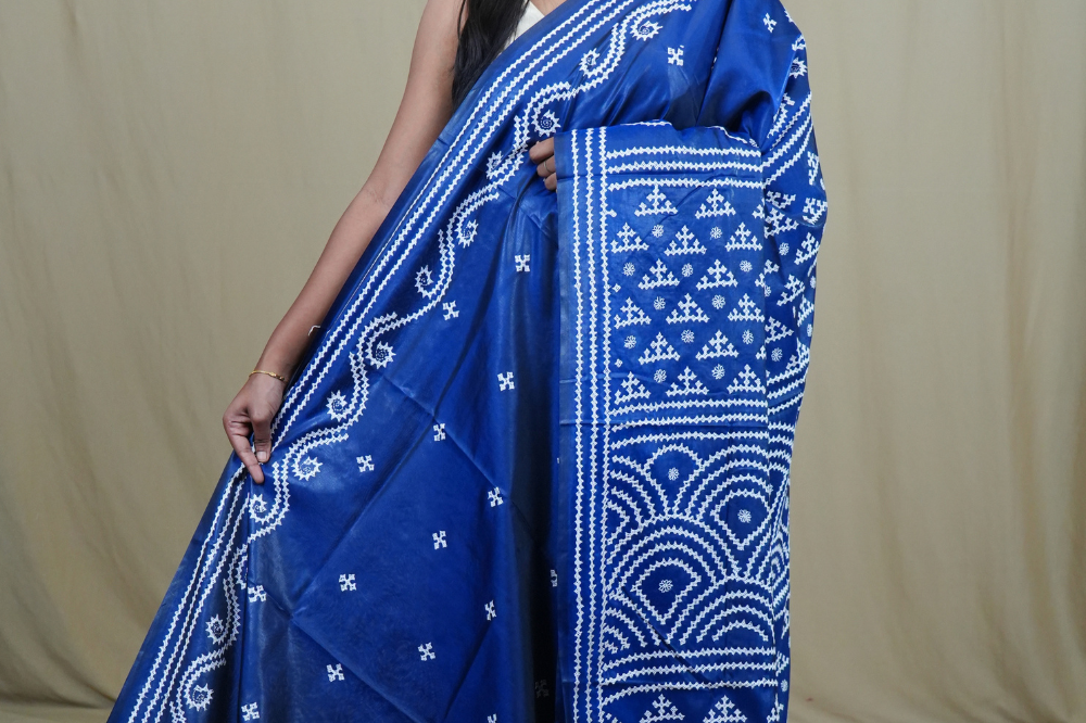 Semi Bangalore Silk Saree with all-over Kutch work motifs and rich embroidered pallu.
