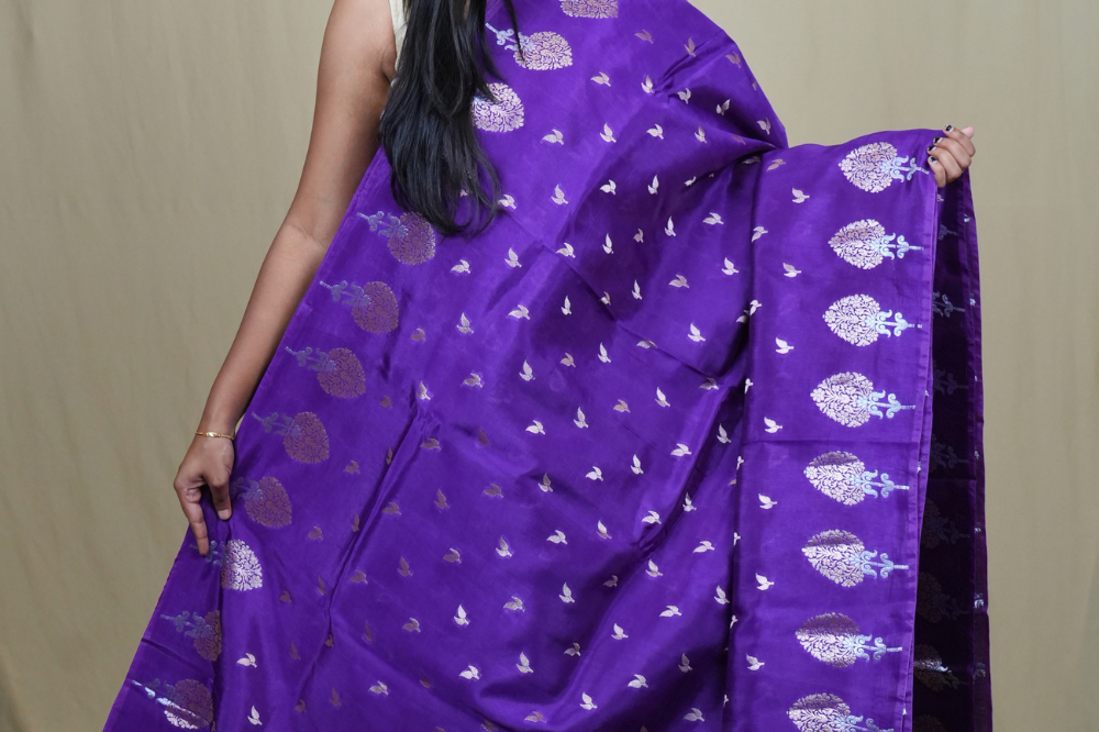 Traditional Banarasi silk saree featuring rich brocade pallu and matching brocade blouse.
