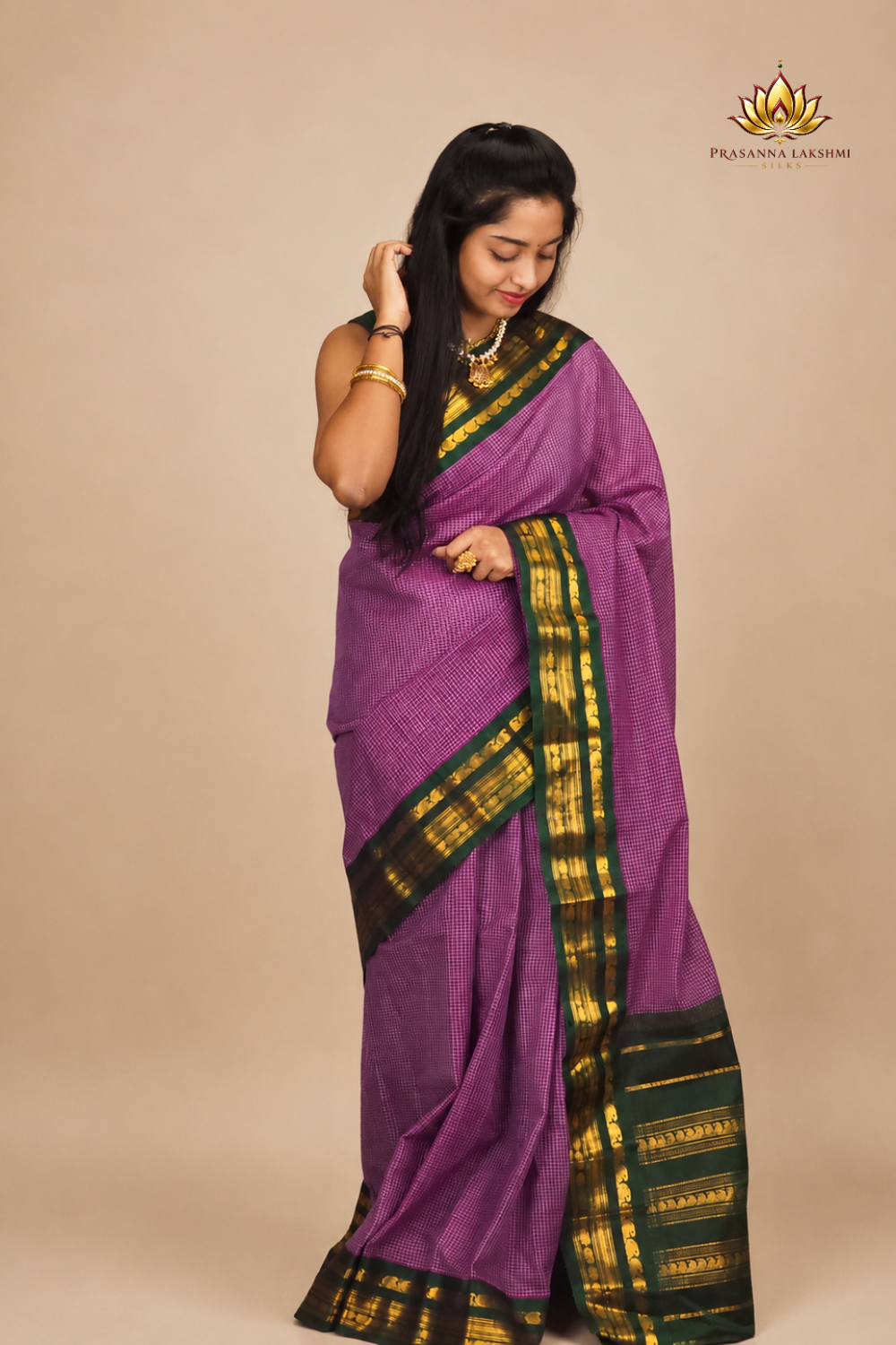 Authentic handloom Gadwal cotton saree ideal for office and temple wear with subtle zari detailing.