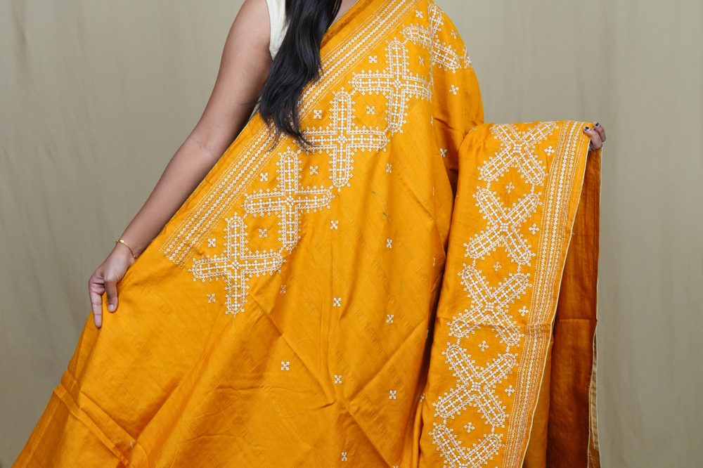 Traditional semi Tussar saree suitable for festive occasions with intricate Kutch work detailing.