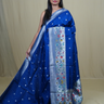 Tussar Georgette Saree with all-over silver zari woven motifs and floral Meenakari borders.
