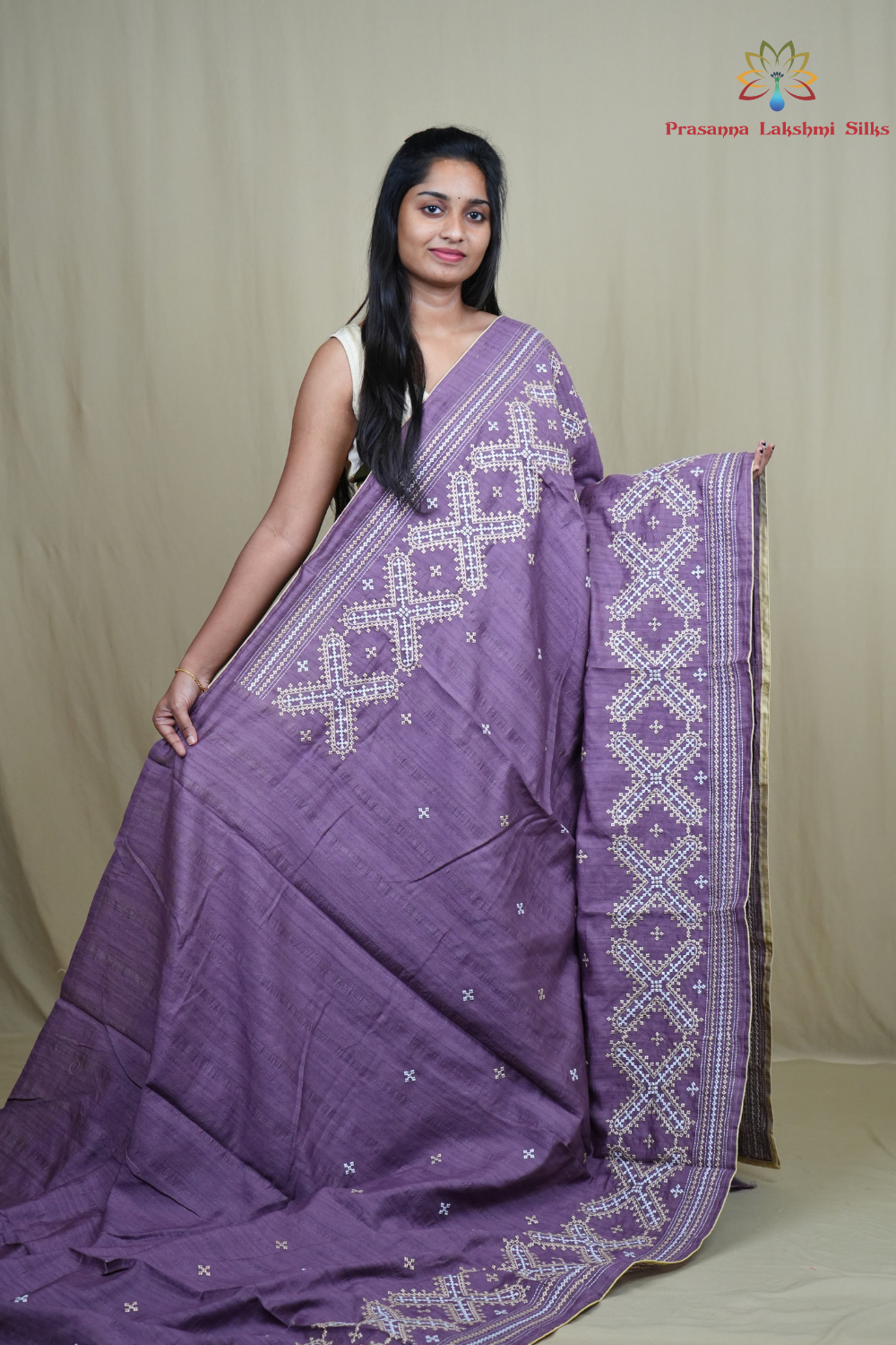 Traditional semi Tussar saree suitable for festive occasions with intricate Kutch work detailing.