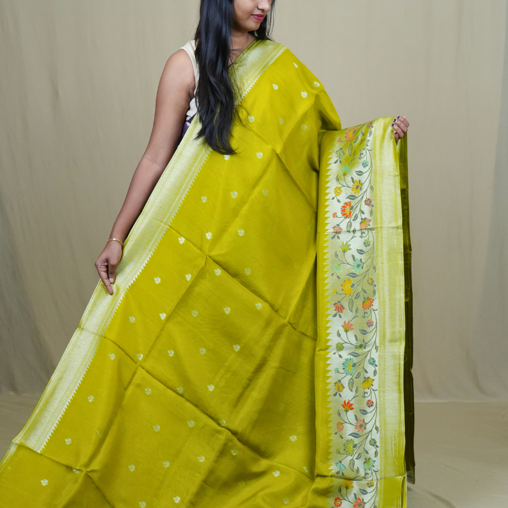Traditional Tussar Georgette saree suitable for weddings and festive occasions with zari work.