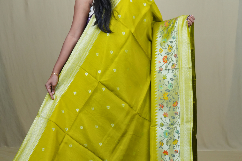 Traditional Tussar Georgette saree suitable for weddings and festive occasions with zari work.