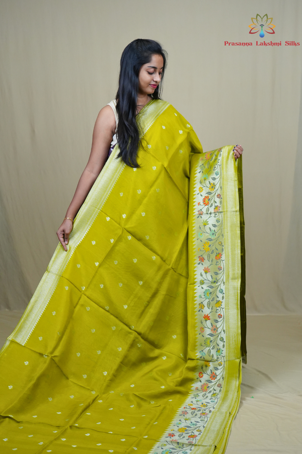 Traditional Tussar Georgette saree suitable for weddings and festive occasions with zari work.