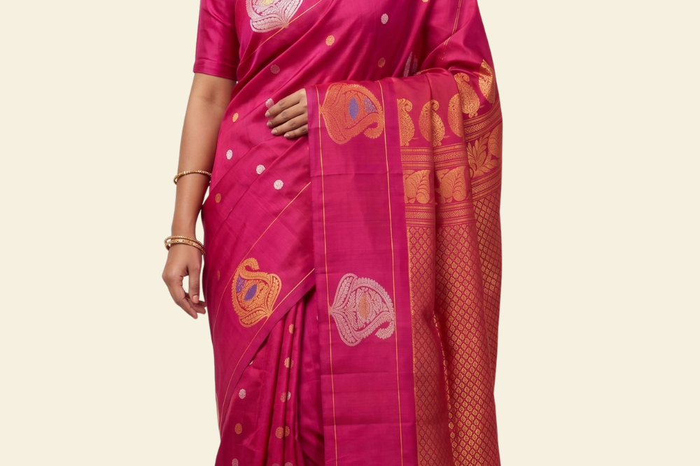 Pure handloom Gadwal silk saree with all-over zari motifs and intricate turning borders
