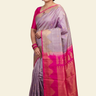 Pure handloom Gadwal silk saree with all-over zari motifs and intricate turning borders
