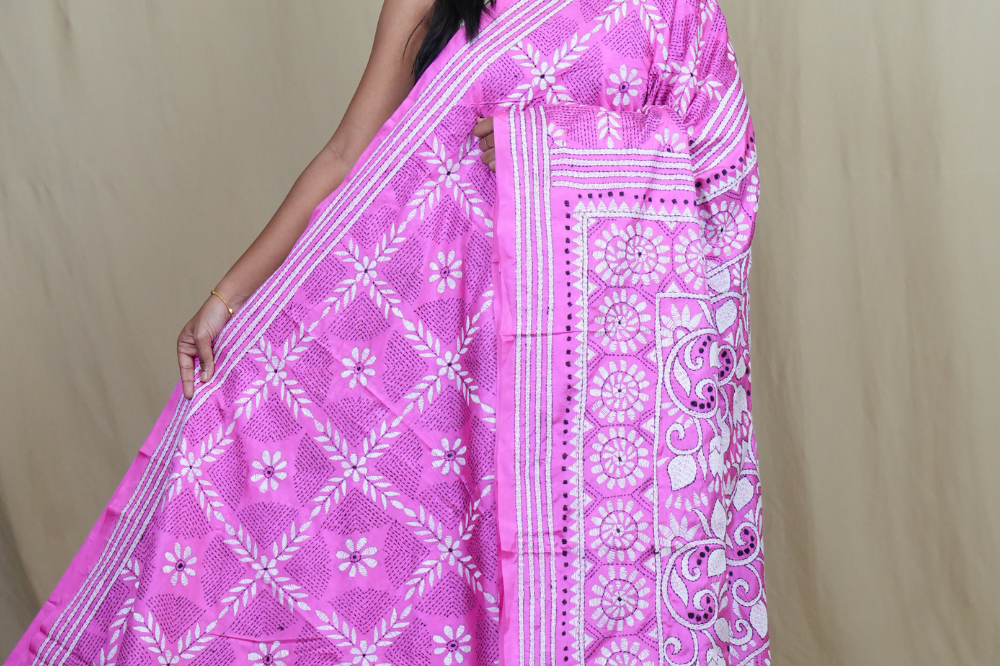 Semi Bangalore silk saree with all-over hand Kantha work and rich embroidered pallu.
