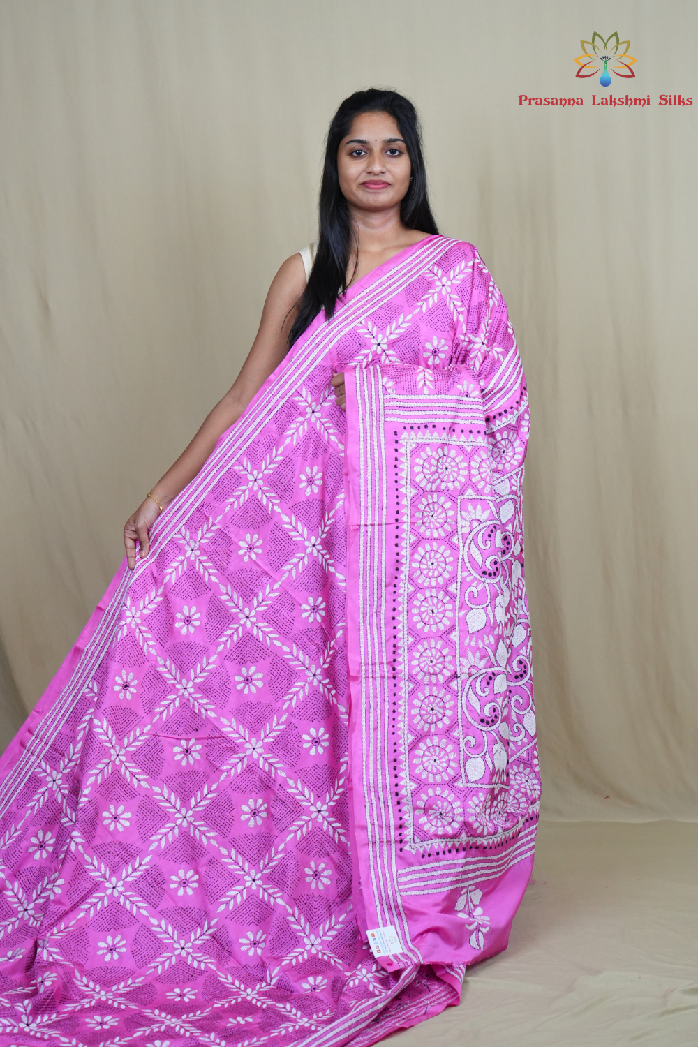 Semi Bangalore silk saree with all-over hand Kantha work and rich embroidered pallu.
