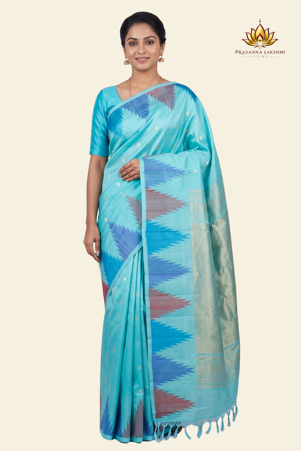 Pure handloom Gadwal silk saree with all-over zari motifs and intricate turning borders
