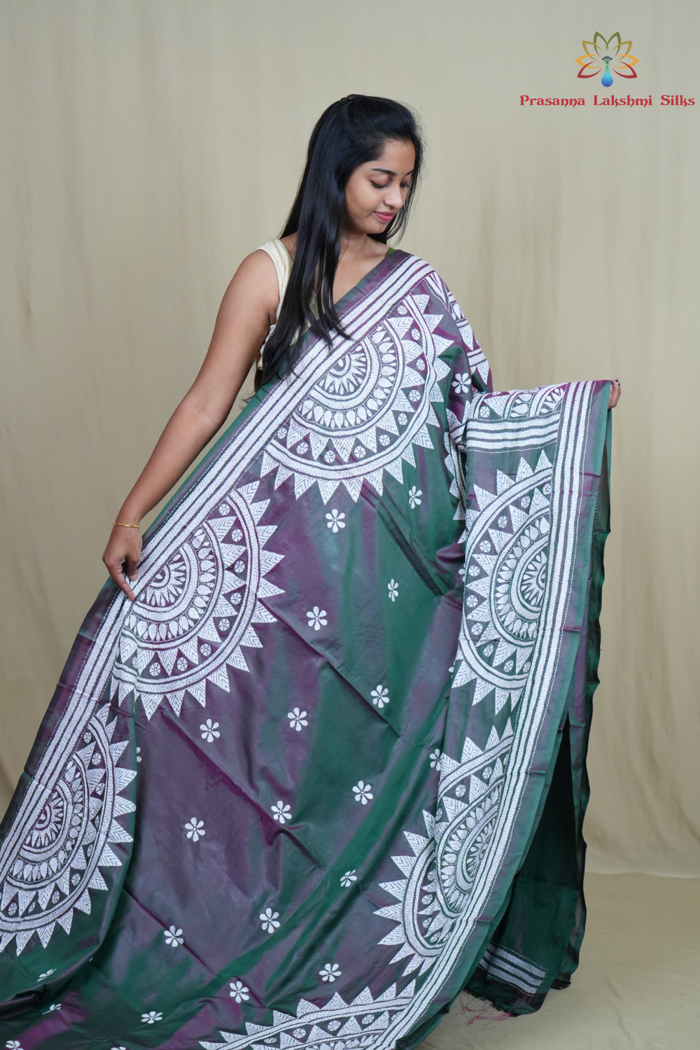 Elegant silk saree featuring Kantha work borders and detailed Kantha pallu design.
