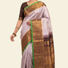 Pure handloom Gadwal silk saree with all-over zari motifs and intricate turning borders
