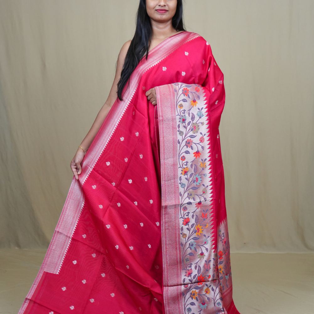Tussar Georgette Saree with all-over silver zari woven motifs and floral Meenakari borders.
