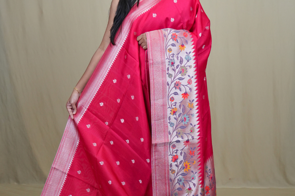 Tussar Georgette Saree with all-over silver zari woven motifs and floral Meenakari borders.
