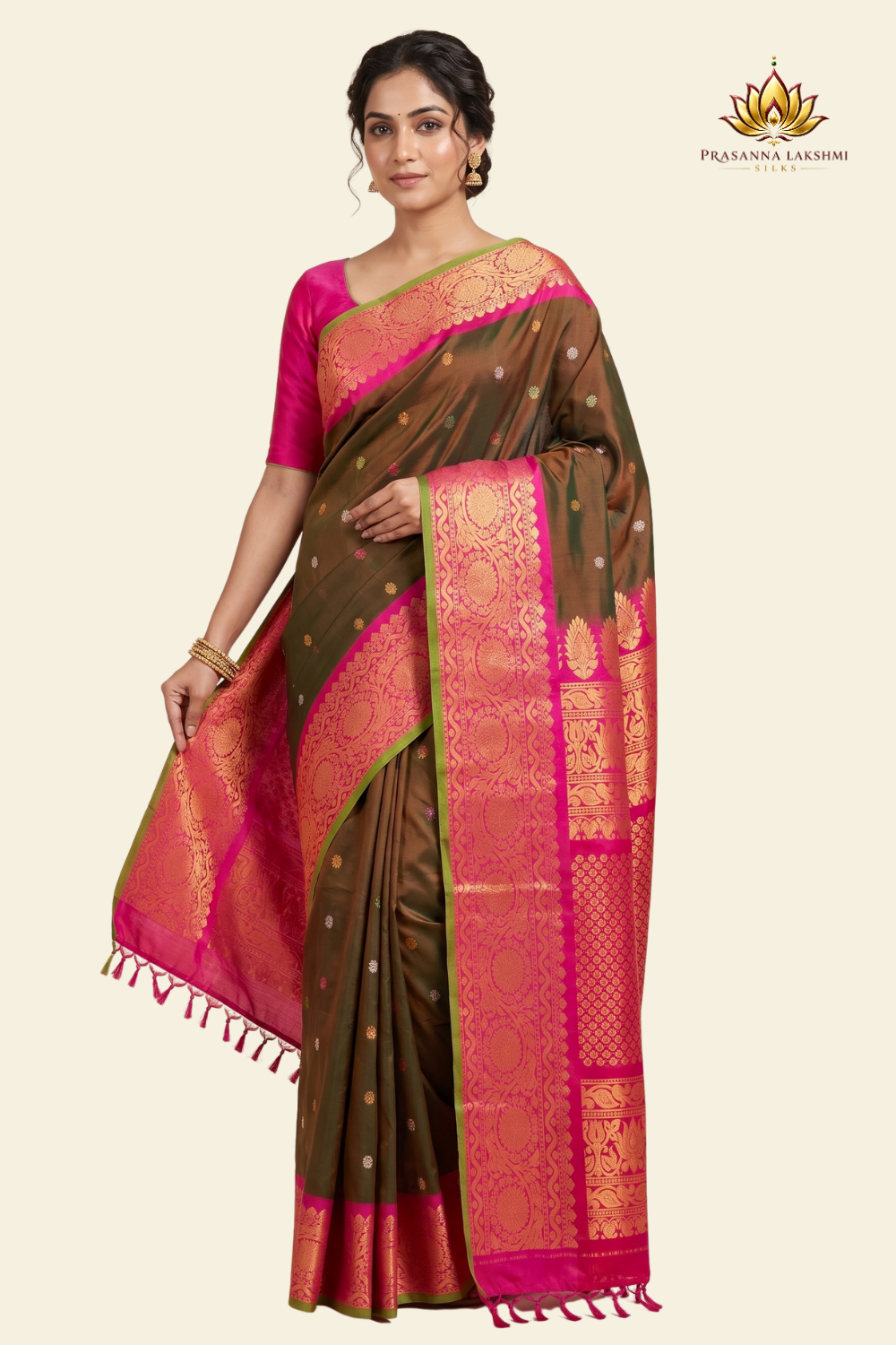 Pure handloom Gadwal silk saree with all-over zari motifs and intricate turning borders
