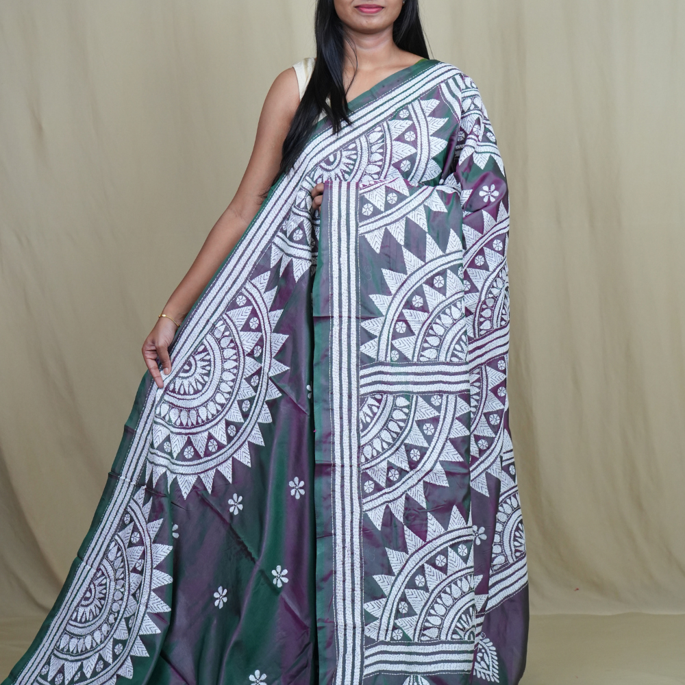 Semi Bangalore silk saree with all-over hand Kantha work and rich embroidered pallu.