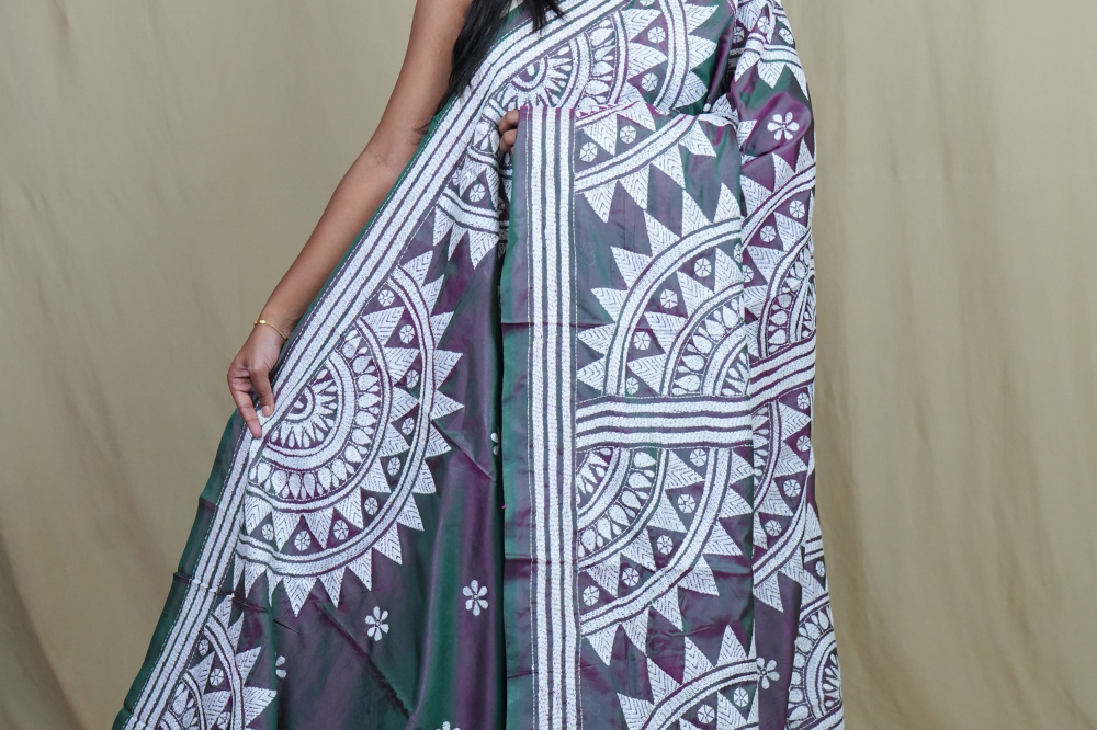 Semi Bangalore silk saree with all-over hand Kantha work and rich embroidered pallu.