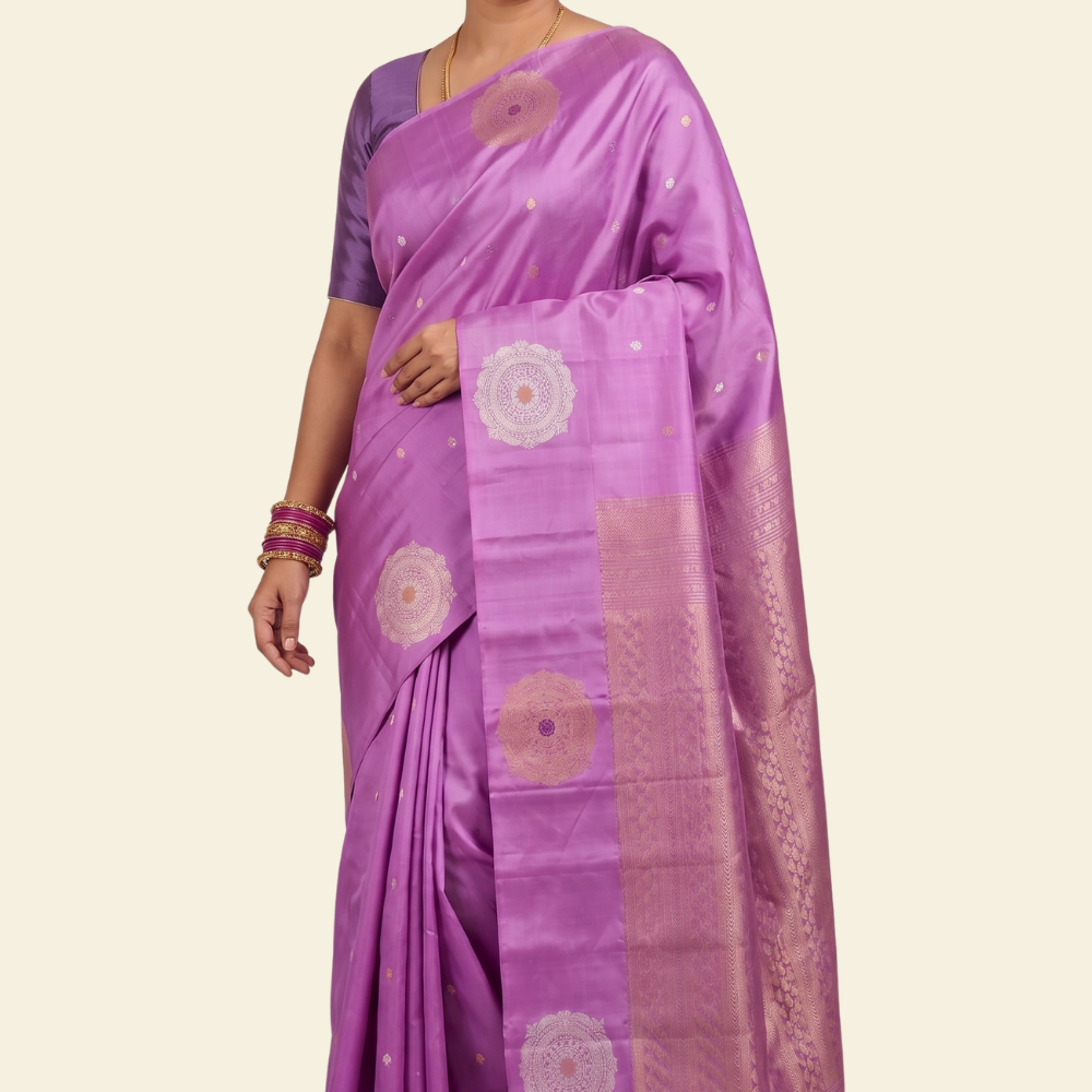Pure handloom Gadwal silk saree with all-over zari motifs and intricate turning borders
