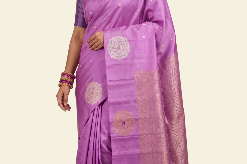 Pure handloom Gadwal silk saree with all-over zari motifs and intricate turning borders
