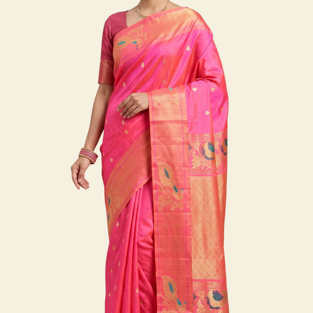 Pure handloom Gadwal silk saree with all-over zari motifs and intricate turning borders
