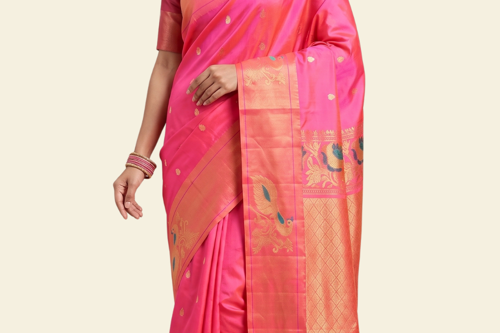 Pure handloom Gadwal silk saree with all-over zari motifs and intricate turning borders

