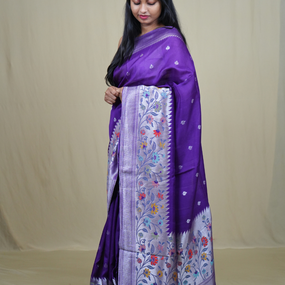 Tussar Georgette Saree with all-over silver zari woven motifs and floral Meenakari borders.
