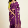 Banarasi Munga silk saree with all-over zari woven floral motifs and rich brocade pallu.
