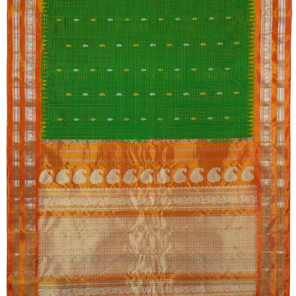 Traditional handloom Gadwal pure silk saree with zari woven tissue borders suitable for weddings.