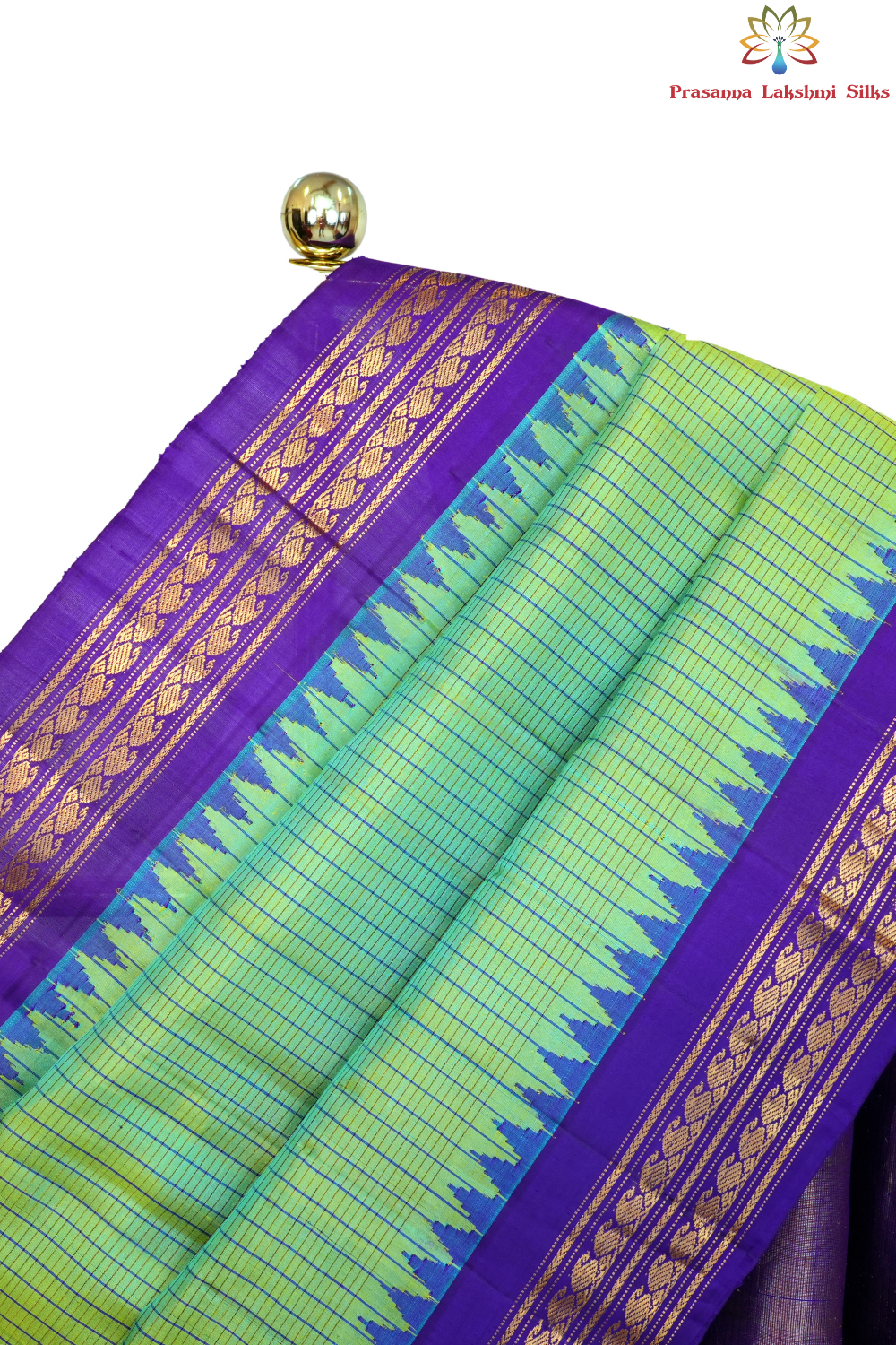 Handloom Gadwal pure silk saree with all-over zari stripes and rich tissue pallu.
