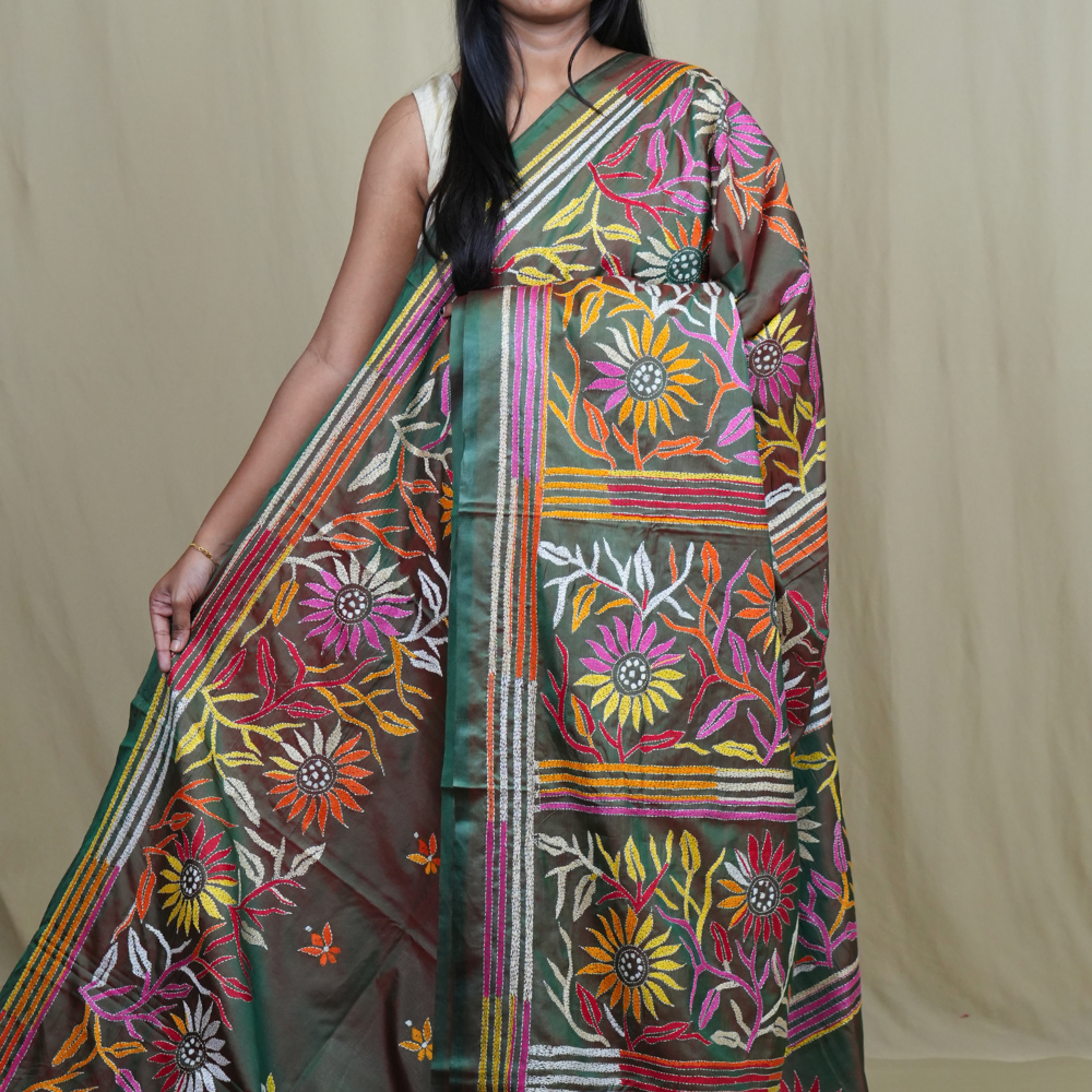 Semi Bangalore silk saree with all-over hand Kantha work and rich embroidered pallu.