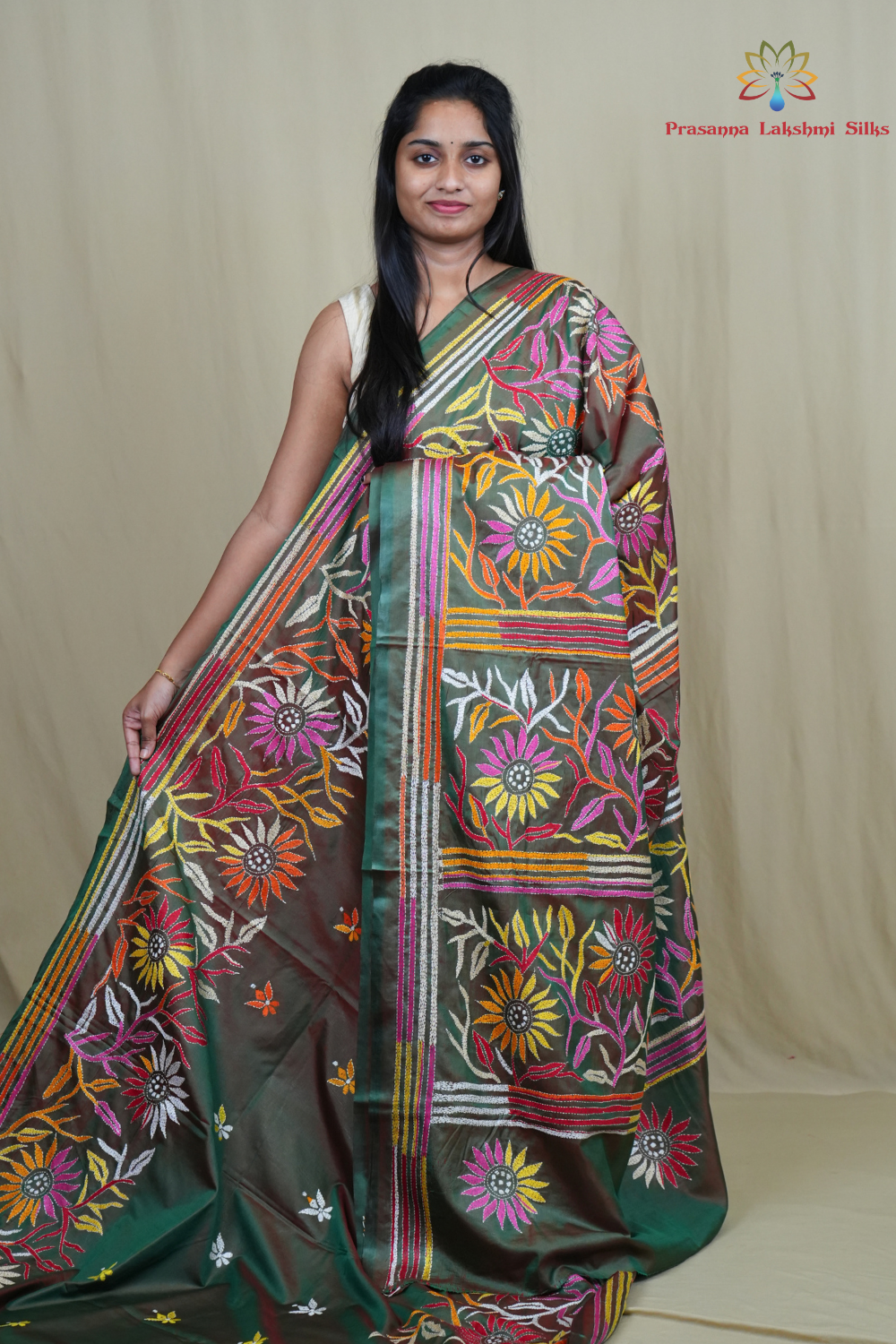 Semi Bangalore silk saree with all-over hand Kantha work and rich embroidered pallu.