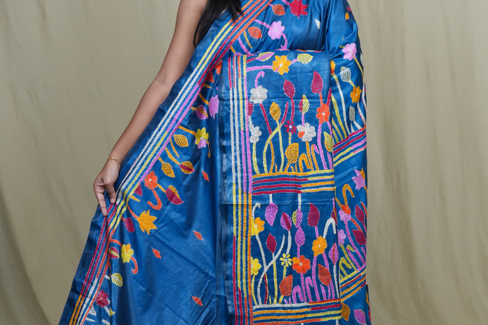 Semi Bangalore silk saree with all-over hand Kantha work and rich embroidered pallu.
