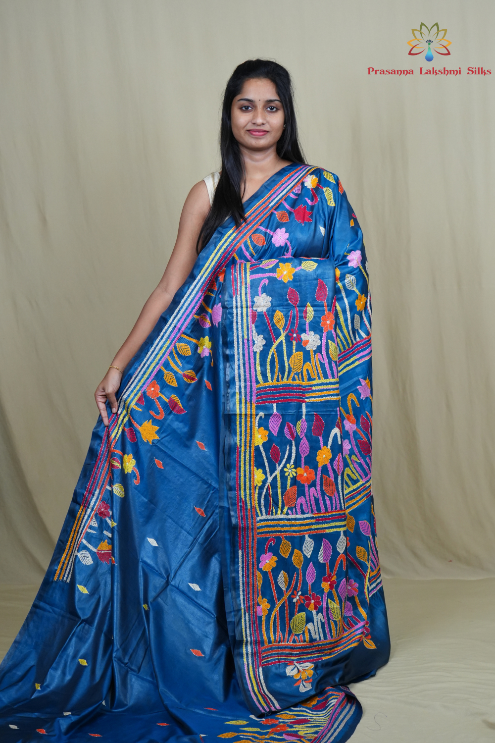 Semi Bangalore silk saree with all-over hand Kantha work and rich embroidered pallu.
