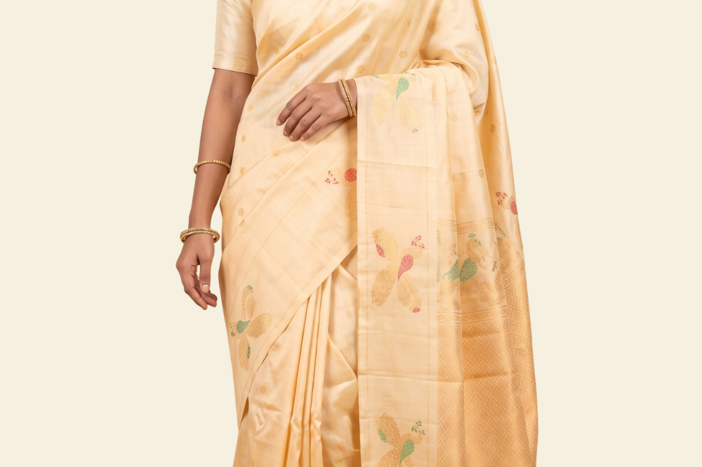 Pure handloom Gadwal silk saree with all-over zari motifs and intricate turning borders
