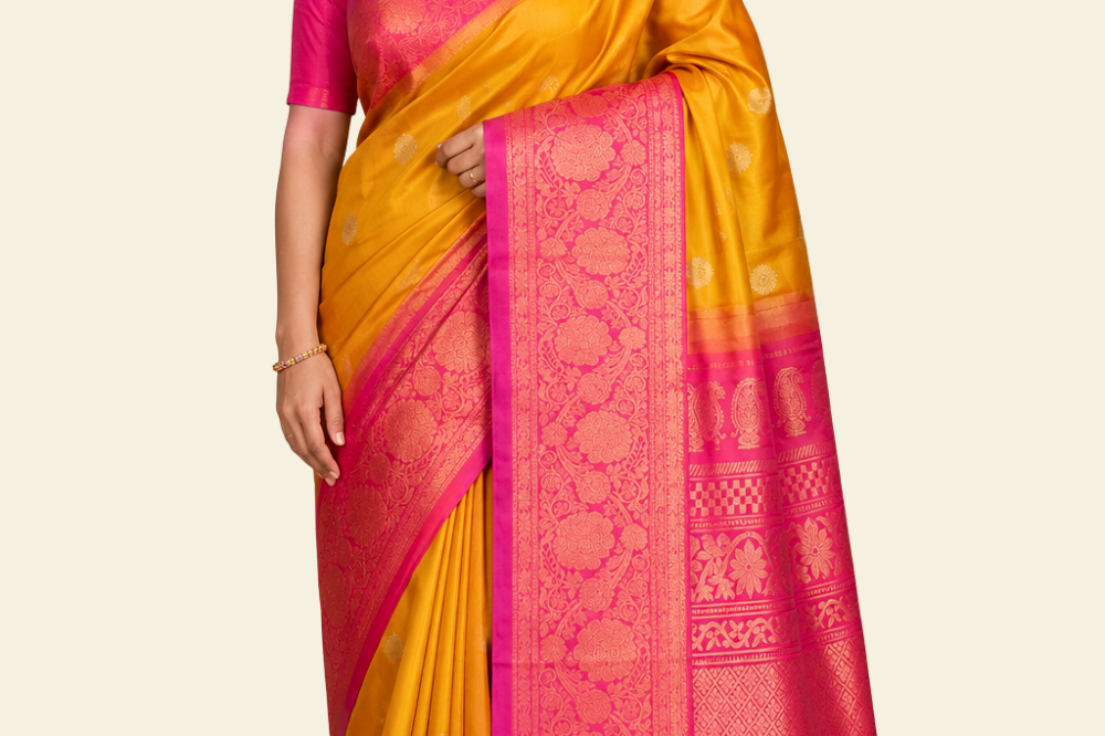 Pure handloom Gadwal silk saree with all-over zari motifs and intricate turning borders
