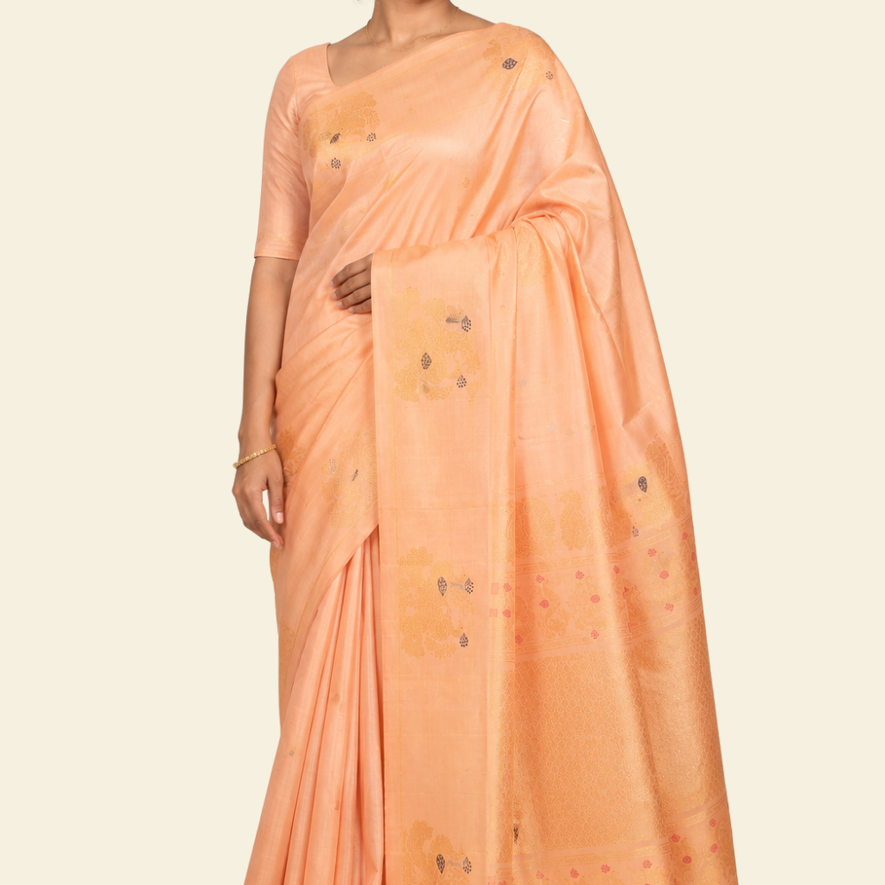 Pure handloom Gadwal silk saree with all-over zari motifs and intricate turning borders
