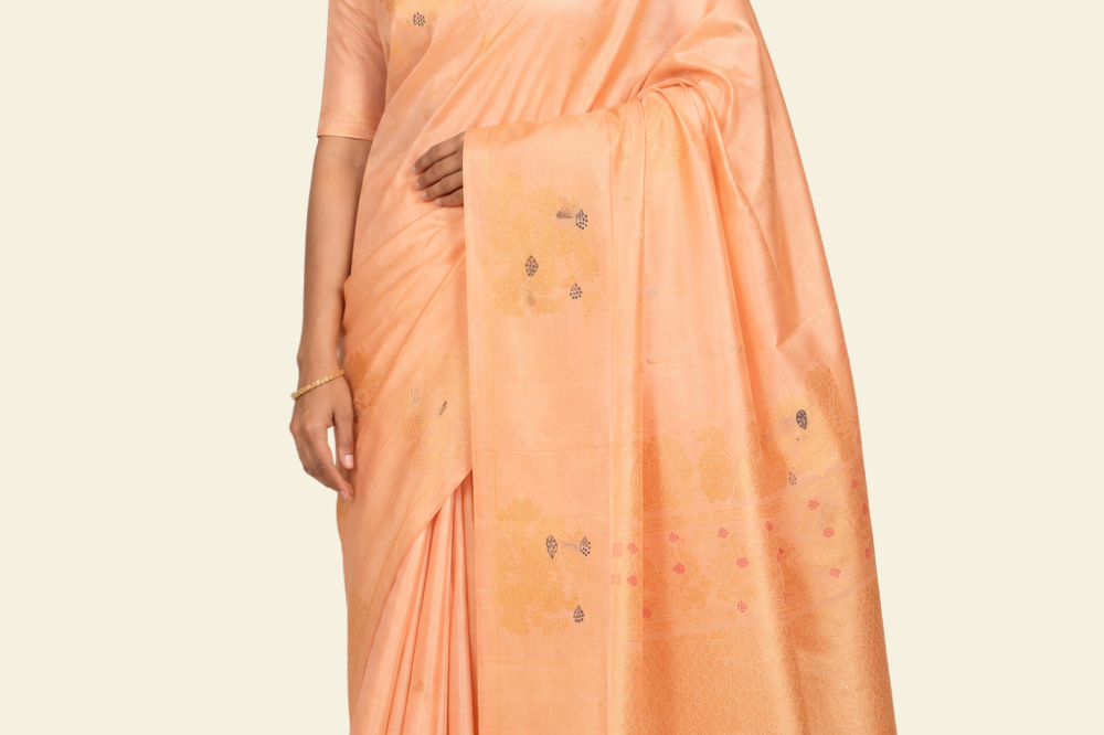 Pure handloom Gadwal silk saree with all-over zari motifs and intricate turning borders
